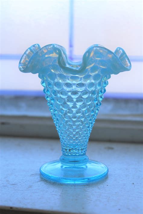 Fenton blue hobnail - In 1940, Fenton introduced Hobnail into their general line in Blue Opalescent, French Opalescent, Cranberry Opalescent and Green Opalescent. Many of these colors are still found in the secondary market …